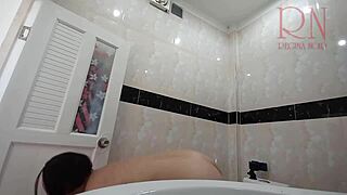 The maid cleans the office toilet and shower naked.