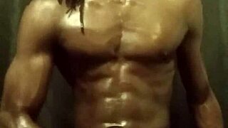 I stroke my big black cock with lots of oil