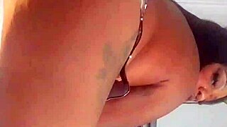 Ebony pornstar Blackvelvet shows off big tits in anal solo