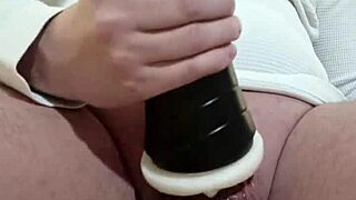 a young amateur explores solo fetish play with a fleshlight, capturing a close-up cumshot
