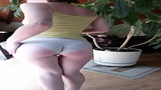 check out this fit girl modeling round ass in panties