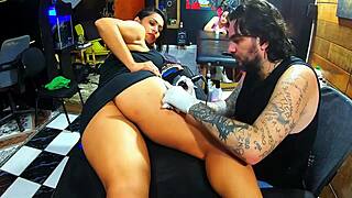 I saw this brunette who drove the tattoo artist wild