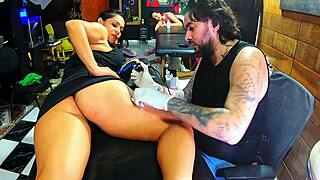 I saw this brunette who drove the tattoo artist wild