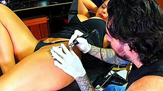 I saw this brunette who drove the tattoo artist wild