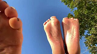 mistress lara and dominatrix nika are showing their beautiful feet on the beach