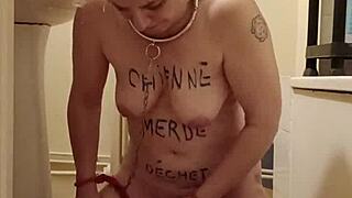 Watch this milf slave flashing her natural tits while bound in bdsm humiliation