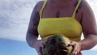 young woman flashes swollen pussy on usa beach in tight bikini