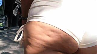 Feeling excited walking in public with see-through mini shorts, flashing ass to voyeurs