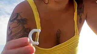 young woman flashes swollen pussy on usa beach in tight bikini