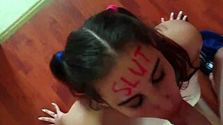 Lipstick slut gags on deepthroat while getting face fucked and spat on