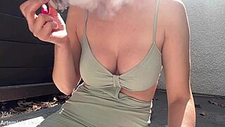 Enjoying a relaxed smoking session outdoors in slow motion with european charm