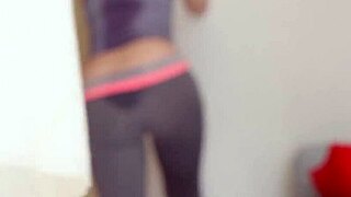 Innocent Asian babe in tight clothes teases with erotic stretches for sneaky viewers.
