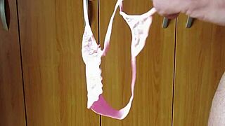 Feeling so aroused in these pink panties while masturbating with my cock.