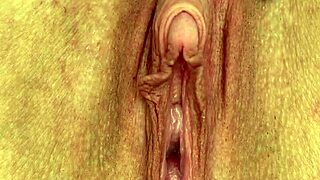 euroslut rubs her big clit close up until she squirts