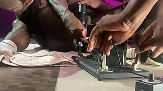 This amateur ebony milf with shaved pussy gets into bdsm machine action at home. She uses toys and vibrator for wet solo slave play while muscular and naked.