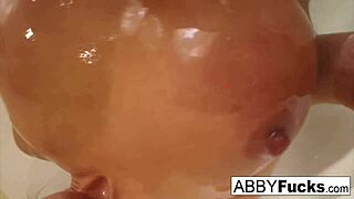 abigail takes a quick shower and shaves her pussy while masturbating solo