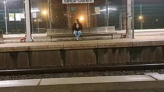 Outdoor train station encounter with a stranger