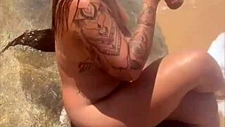 young african girl flashes on the beach exhibitionist style