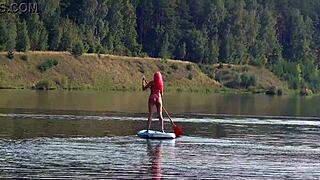 Sup and pink micro bikini in garden outdoor nature