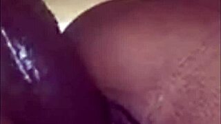 Ebony babe plays with her wet pussy using a big dildo 😍