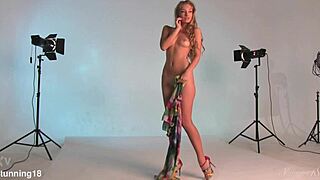 this blonde teen with hazel eyes is posing nude