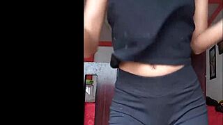 Hot skinny model dances seductively, revealing her perfect body in a tiny outfit.