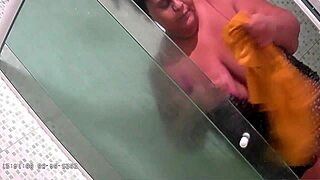 Hidden camera catches the naughty fat stepmom taking dick passionately.