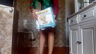 Hot sexy diaper girl pees into her tight dress and diaper.