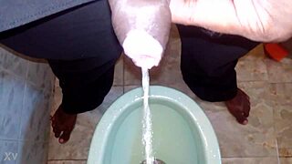 boy pee black man pissing pee peeing boy urinate?
