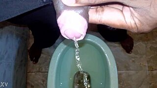 boy pee black man pissing pee peeing boy urinate?