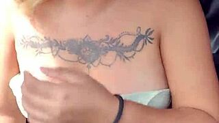 showing panties and tits in car on highway