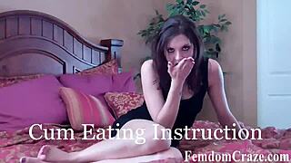 mistress demonstrates domination using strapon on slave