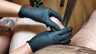 Black oiled gloves provide intense pleasure during exam