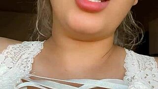 big tits blonde gets a close-up view of her natural boobs