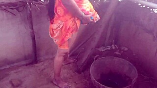 A housewife with big boobs shows off in her village house