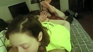 Laying on her stomach and deepthroating like a good slave