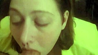 Laying on her stomach and deepthroating like a good slave