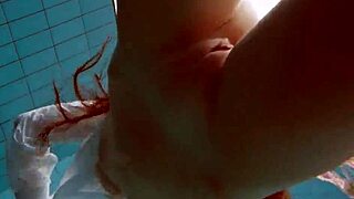 Redhead Babe Lola Swims Underwater with Big Tits