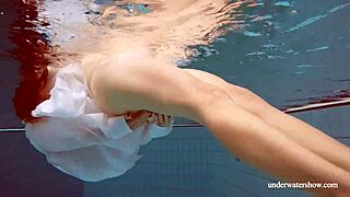 Redhead Babe Lola Swims Underwater with Big Tits