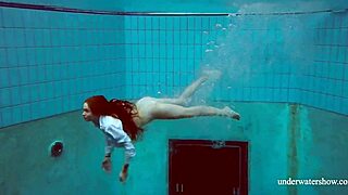 Redhead Babe Lola Swims Underwater with Big Tits