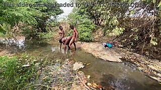 Curvy brown-skinned ebony at the stream