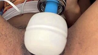 Ebony woman edges her hairy pussy