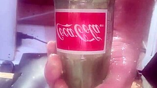 I slide a huge bottle deep into my ass, feeling every inch as I masturbate alone.