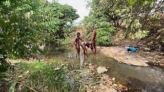 Curvy brown-skinned ebony at the stream