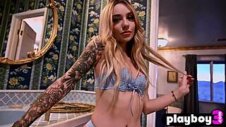 The inked blonde teen reveals her amazing body in Playboy poses.