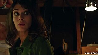 Lizzy Caplan appears in Frankie Boom 2013, showcasing her figure.