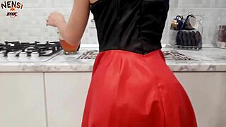 The kinky housewife masturbates through torn pantyhose. She plays with the cream.