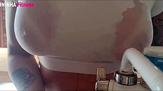 i'm a horny brazilian housewife washing dishes naked, big tits on display