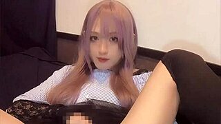 check out this cute pink-haired ladyboy playing with a vibrator in her ass