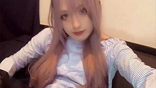 check out this cute pink-haired ladyboy playing with a vibrator in her ass